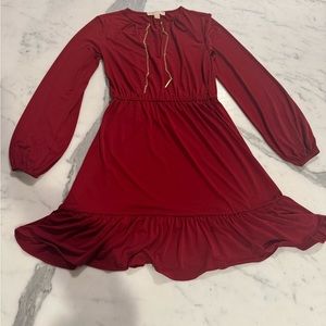 red short dress with ruffle bottom. Cinched waist 12 inches. Worn once.